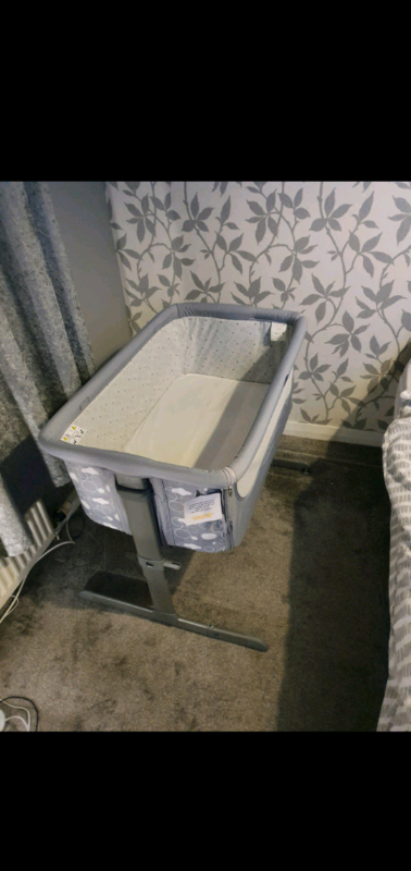 chicco next to me grey clouds